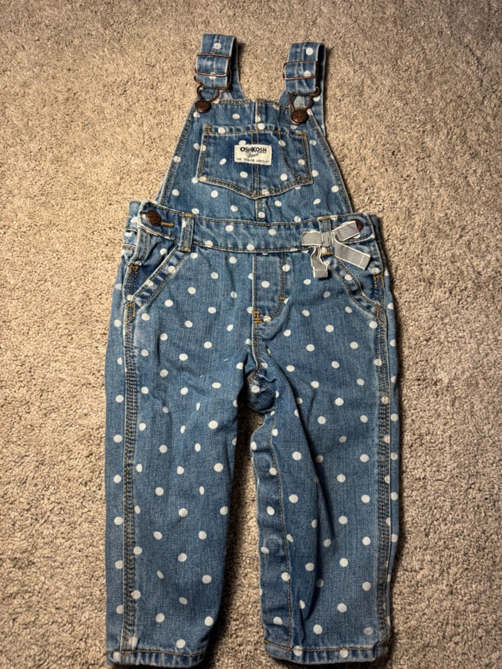OshKosh B'gosh Blue Denim Overalls with White Polka Dots and Bow. Size 12 mos